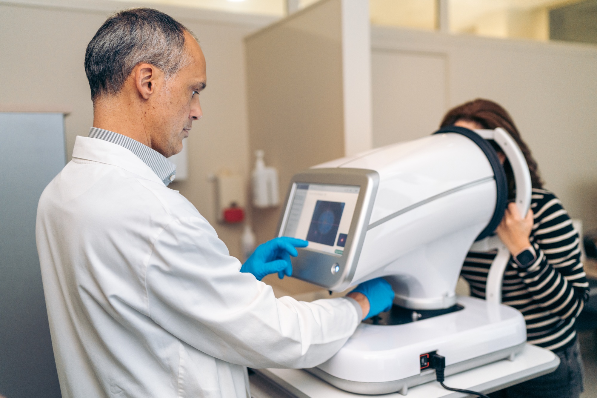 Healthcare Professional Operating Advanced Ophthalmic Diagnostic Equipment